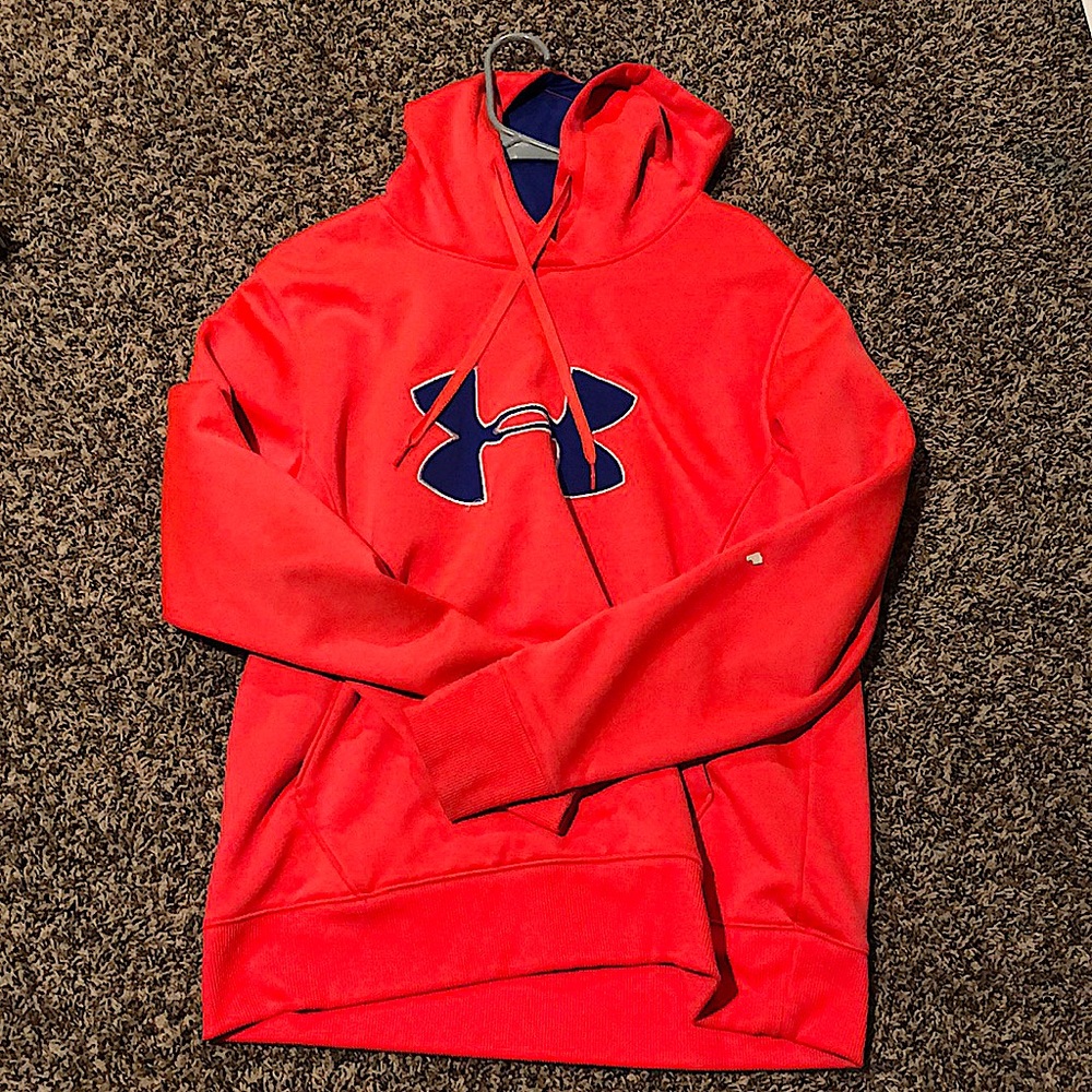 Neon orange/pink with a blue under armor sign.